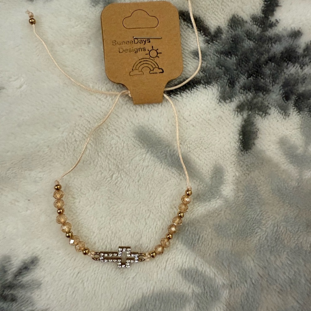 Gold Bracelet with Cross Charm